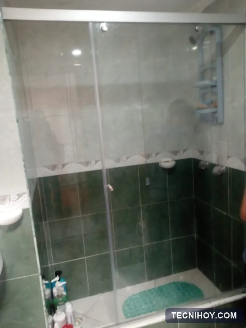 Cambio de riel superior y sistema de corredera en división de baño