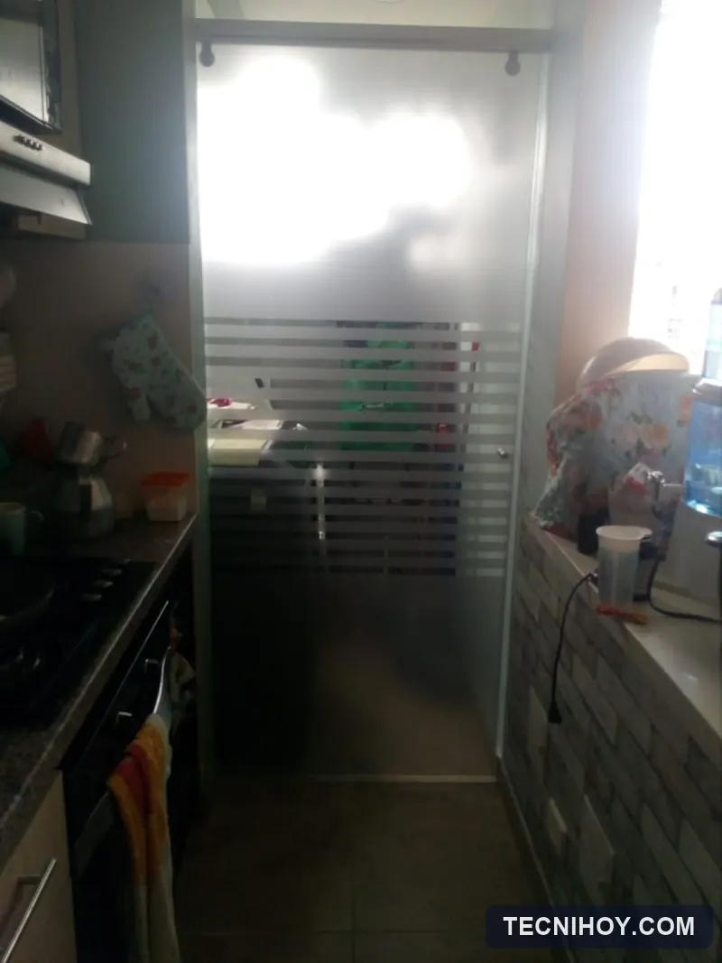 Nivelación de puerta corrediza de vidrio en lavandería